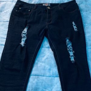 Dark blue ripped skinny jeans